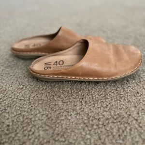 Leather flats or slides.